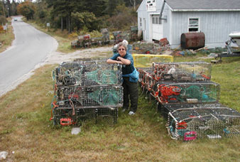 Linda standing around lobster traps